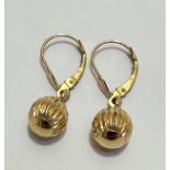A pair of 14ct gold fluted ball pattern earrings, (balls have d 0.5cm) (1.32g)