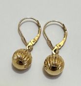 A pair of 14ct gold fluted ball pattern earrings, (balls have d 0.5cm) (1.32g)