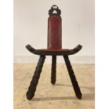 A Spanish brutalist chip carved pine tripod chair H80cm