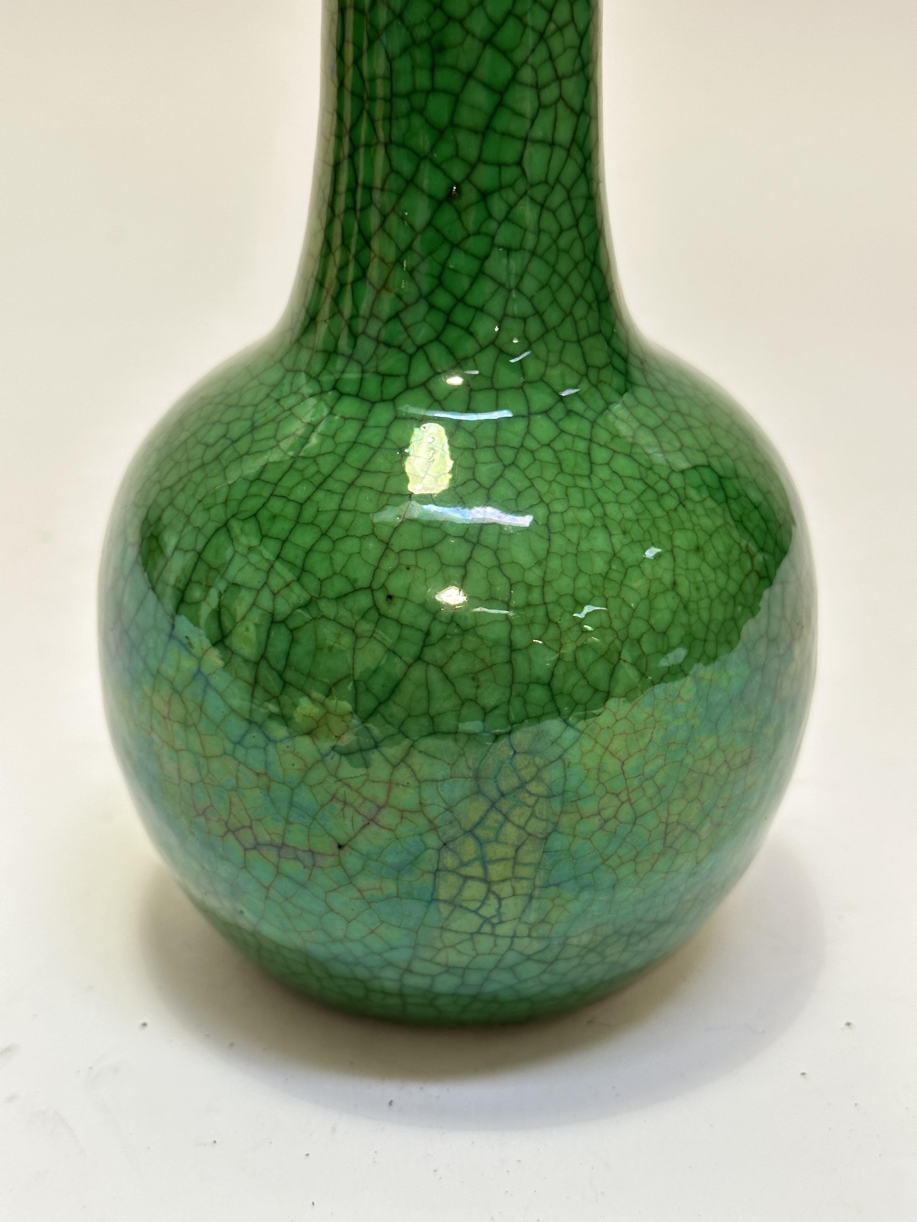 A late 19thc Chinese slim necked bottle style vase with green craquelure glaze, (h 20cm) no signs of - Image 3 of 7