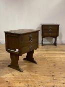 A pair of oak bedside tables, each fitted with three drawers raised on panel end supports, H55cm,