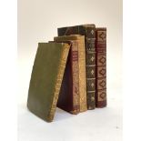 A group of five mainly 19th century gilt leather bound books