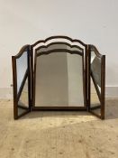 A quality 1930's walnut framed triptych vanity swing mirror of 18th century design with moulded