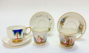 A pair of late 19thc Limoges French porcelain cups and saucers decorated with hand painted figures