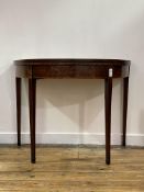 A Georgian mahogany demi lune card table, the rosewood cross banded, boxwood and ebonised strung top