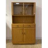 Ercol, A blonde elm side cabinet, the super structure with two glass doors, two drawers and cupboard