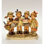 A large Hummel pottery group, We Wish you Best, decorated with polychrome enamels, (22cm x 24cm x