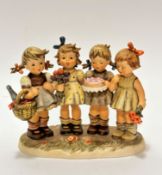 A large Hummel pottery group, We Wish you Best, decorated with polychrome enamels, (22cm x 24cm x