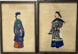 A pair of Chinese late 19thc figures depicting a Courtier with Hat and his Wife, watercolour on