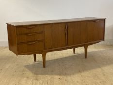McIntosh, A mid century teak sideboard, with three drawers, twin cupboard and fall front cupboard,