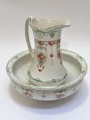 An Edwardian two piece F & Son Ltd china wash set in French pattern, comprising jug with scalloped