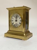 A German brass and glass carriage clock with musical alarm, circa 1890, probably Junghans,