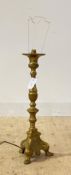 A Roccoco style cast brass lamp, on a triform base with paw feet, H60cm (Excluding bulb holder)