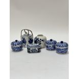 A group of three Chinese blue and white miniature dishes and covers, (9cm x 10cm) an octagonal