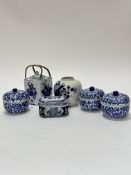 A group of three Chinese blue and white miniature dishes and covers, (9cm x 10cm) an octagonal