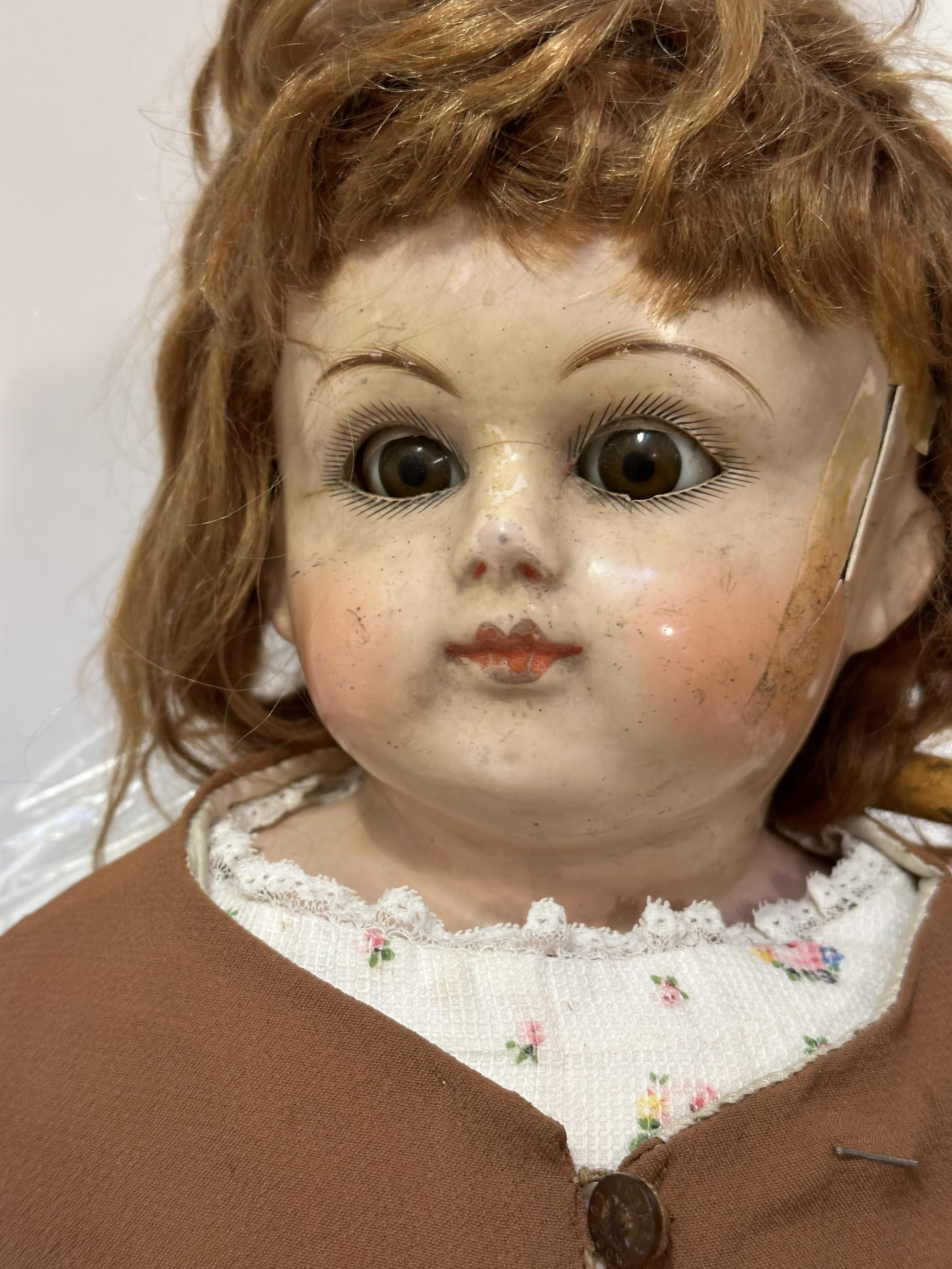 A composition late 19thc early 20thc doll in the Victorian style with stuffed joined body and - Image 7 of 11