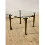 A gilt metal and glass coffee table, H51cm, 69cm x 69cm
