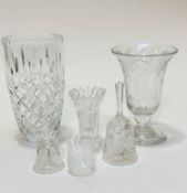 A crystal bell shaped vase with engraved floral sprays, raised on knop stem and circular base with