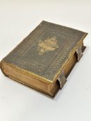 A Victorian tooled leather and brass mounted Holy Bible, Old and New Testaments, by William