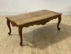 A French style walnut serpentine low table, H43cm, W116cm, D65cm