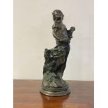 A bronze effect composition study of a young woman in a naturalistic setting, H43cm