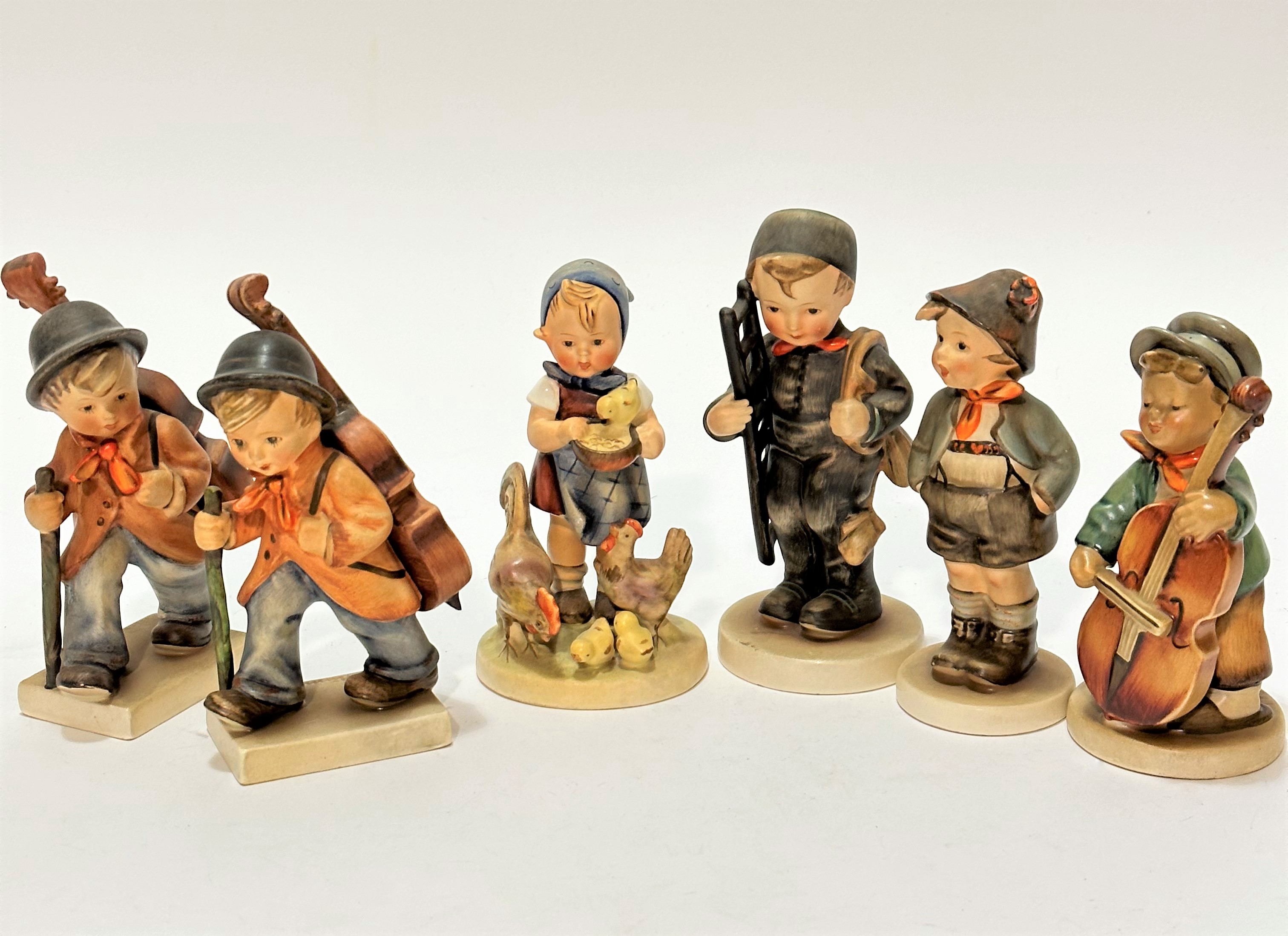 A collection of six Hummel pottery figures The Young One playing with double bass, The Chimney