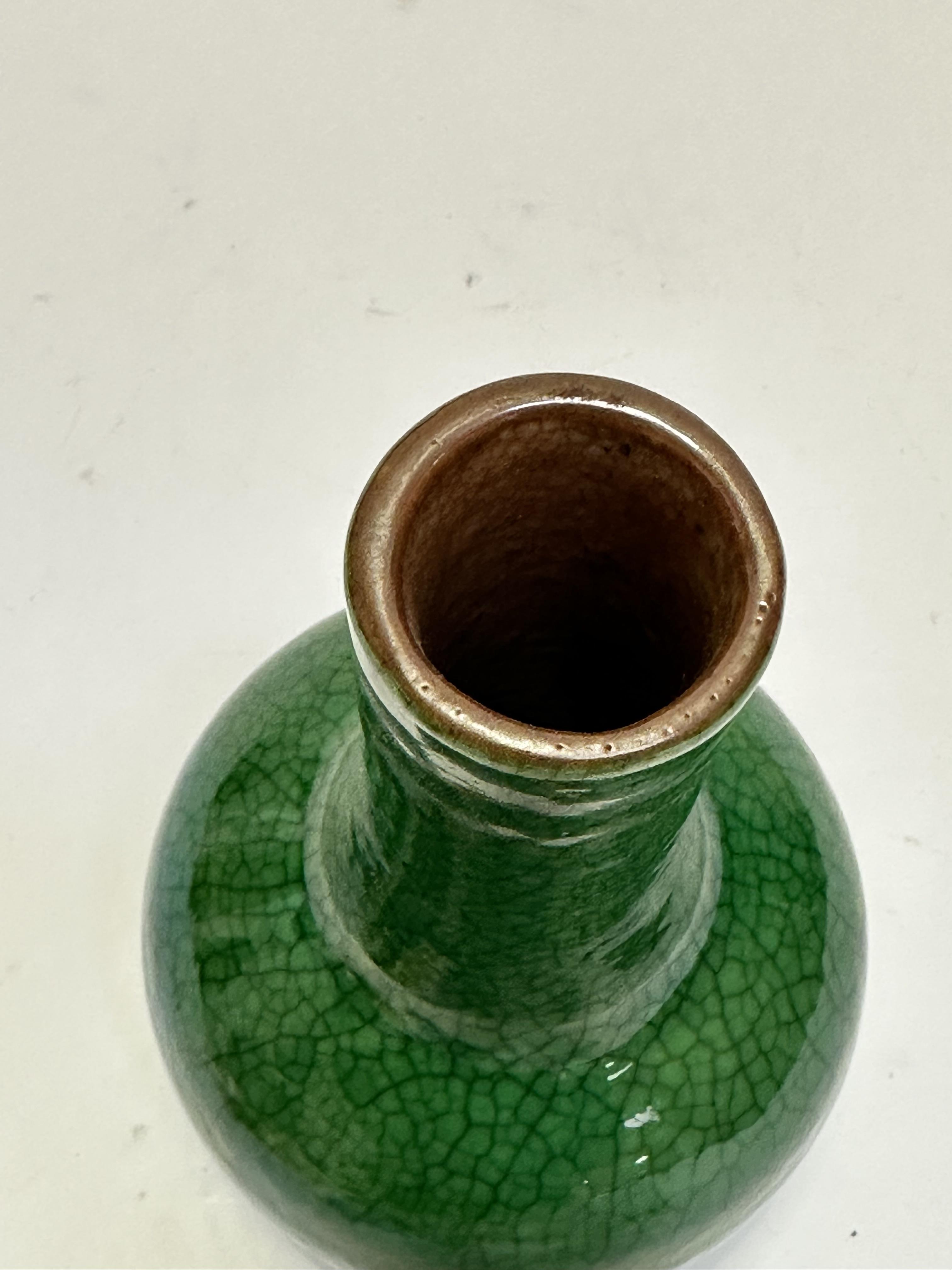 A late 19thc Chinese slim necked bottle style vase with green craquelure glaze, (h 20cm) no signs of - Image 2 of 7
