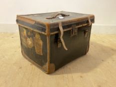 A late 19th century jappaned canvas and leather bound travelling trunk, with carry handle to top,