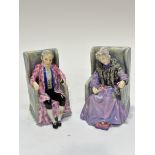 A pair of Royal Doulton figures, Derby and Jones, with original Royal Doulton gilt labels,