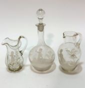 An Edwardian Mary Gregory decorated clear glass jug with scalloped top and C scroll handle to