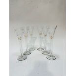 A set of six Edwardian style engraved champagne flutes with gilded decoration, (23cm x 7cm) show