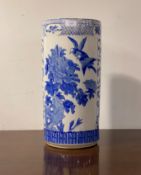 A Chinese style blue and white ceramic stick stand of cylindrical form H47cm