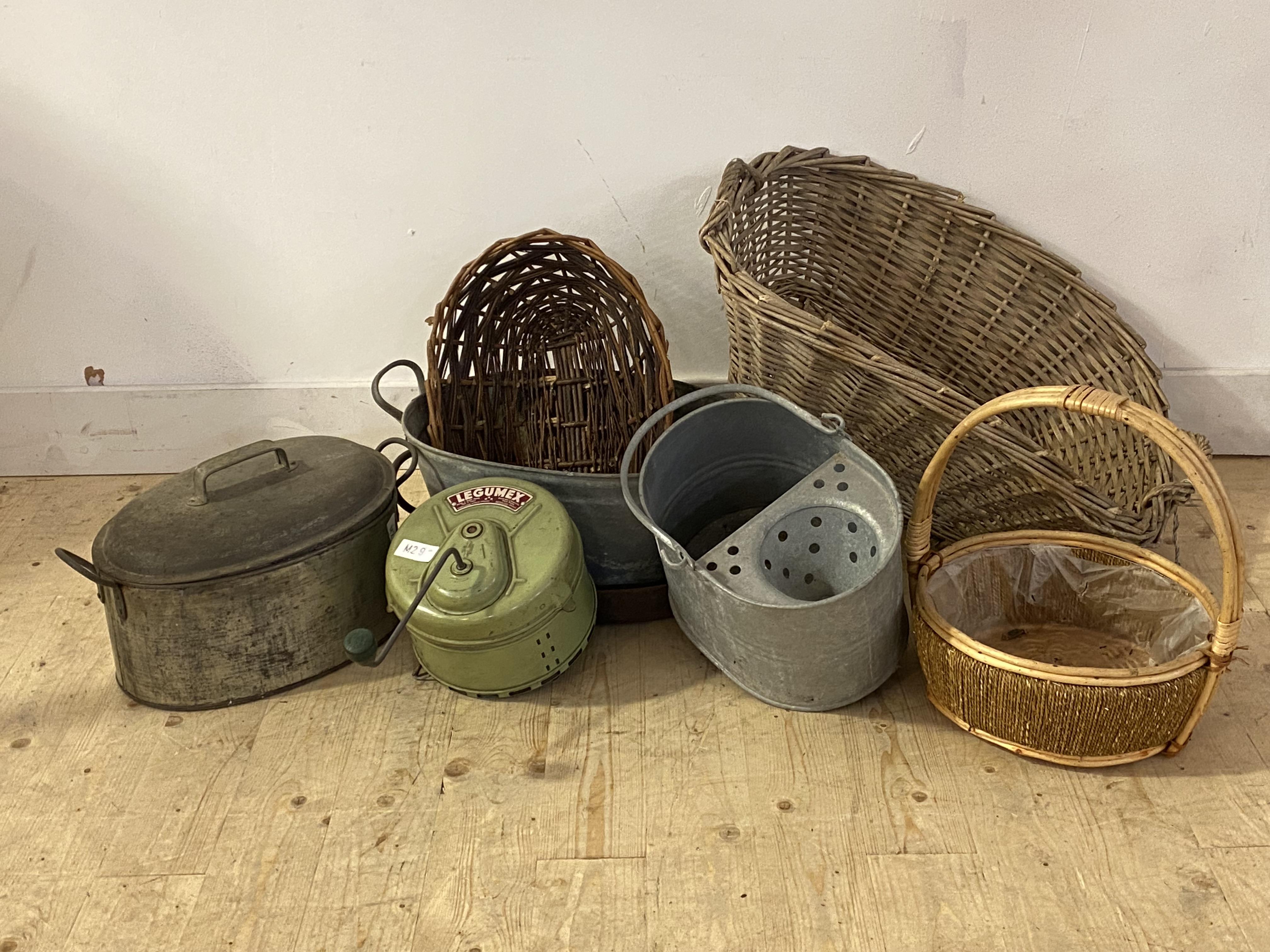 A Vintage legumex vegetable peeler, together with a galvanized tin bucket, planter and pan, a cast