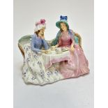 A Royal Doulton china figure group, Afternoon Tea, 809200, (15cm x 19cm x 11cm) decorated with