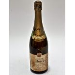 A bottle of 1945 Heidsieck & Co of Rheims Champagne Dry Monopole, label is slight worn, complete