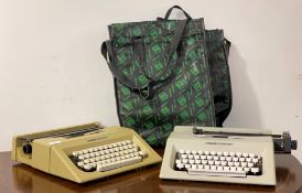 Two Olivetti Lettera 25 typewriters in original canvas cases, W32cm
