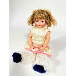 A Simon & Halbig German bisque head doll, 156, with rotating flirty eyes and open mouth, original
