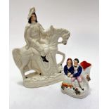 A 19thc china Staffordshire figure group of a courting couple with tree stump to side, decorated