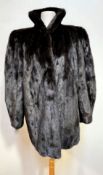 A lady's NLG British Made mink jacket by London label, with satinised lining, slash pockets to side,