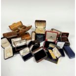 A large quantity of Edwardian jewellery boxes including bracelets, medals, stick pins, pendants, etc