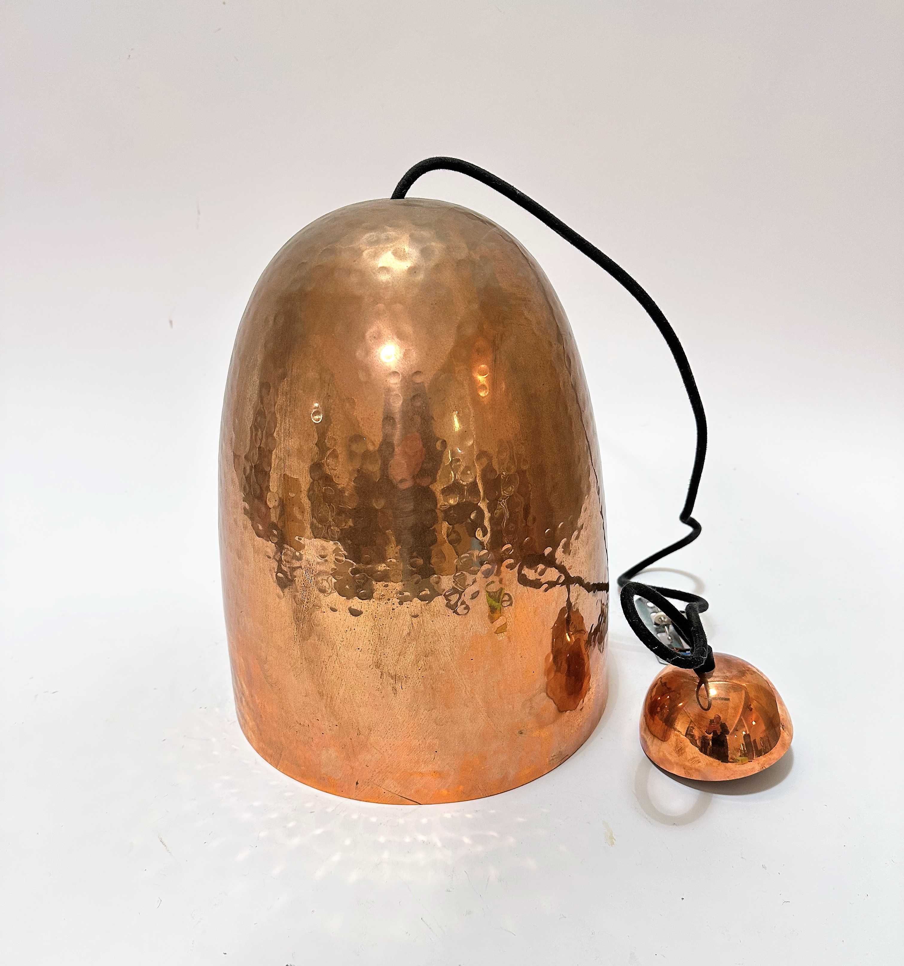 A modern hammered copper tapered dome shaped light fitting complete with cable and fixing, (33cm x
