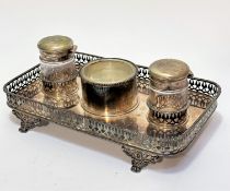 An Edwardian Epns double ink stand, the rectangular top with gallery border and centre glass inset