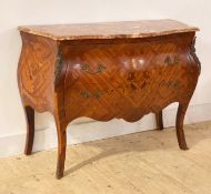 A French kingwood and walnut bombe commode of serpentine outline, the rouge conglomerate marble