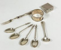 London silver miniature apostle teaspoons with spiral twist stems, a London silver circular napkin