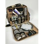 A Concept travelling picnic set in unused condition, complete with stainless steel flask, cups and