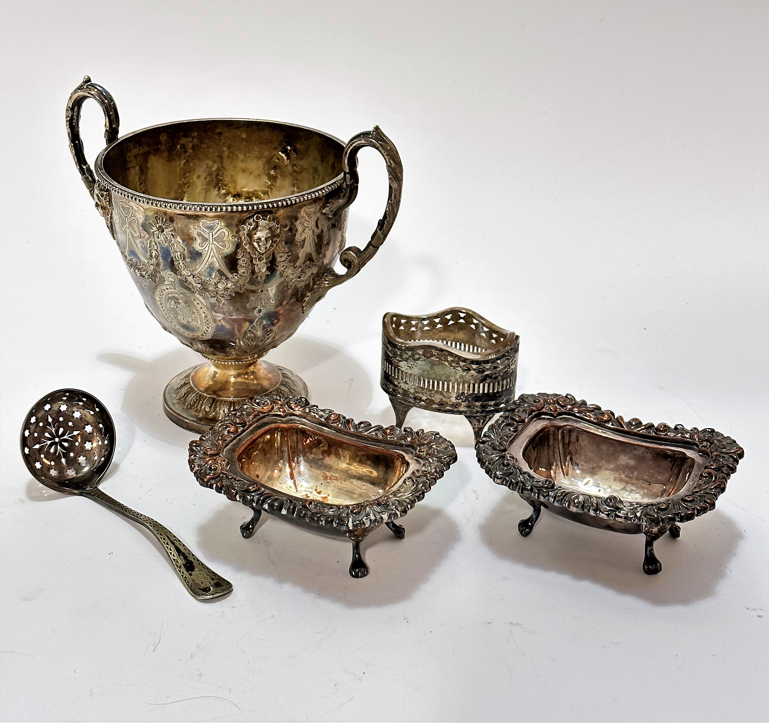 A pair of 19thc Sheffield plated rectangular chased salts, raised on paw feet, and an Edwardian oval