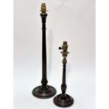 An Edwardian mahogany brass mounted Georgian style candlestick with fluted tapered column and