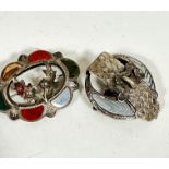 A sterling silver oval Scottish hardstone brooch with double thistle centre panel, one missing