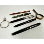 A Parker black plastic fountain pen, nib worn, (L 12cm) an unmarked textured plastic fountain pen in