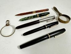 A Parker black plastic fountain pen, nib worn, (L 12cm) an unmarked textured plastic fountain pen in